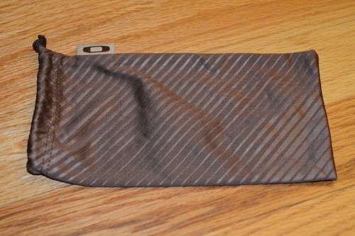 New oakley lens cleaner dark - lens,